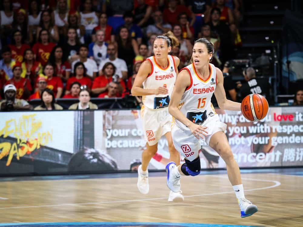 Spanish basketball player Anna Cruz in action during basketball match
