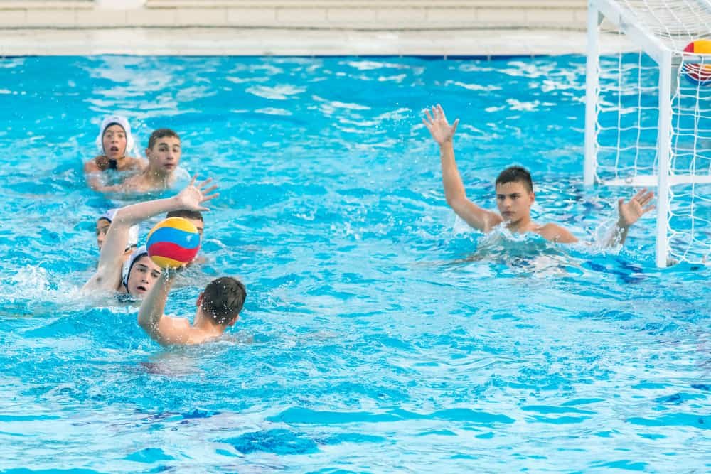 boys playing water polo during competitions