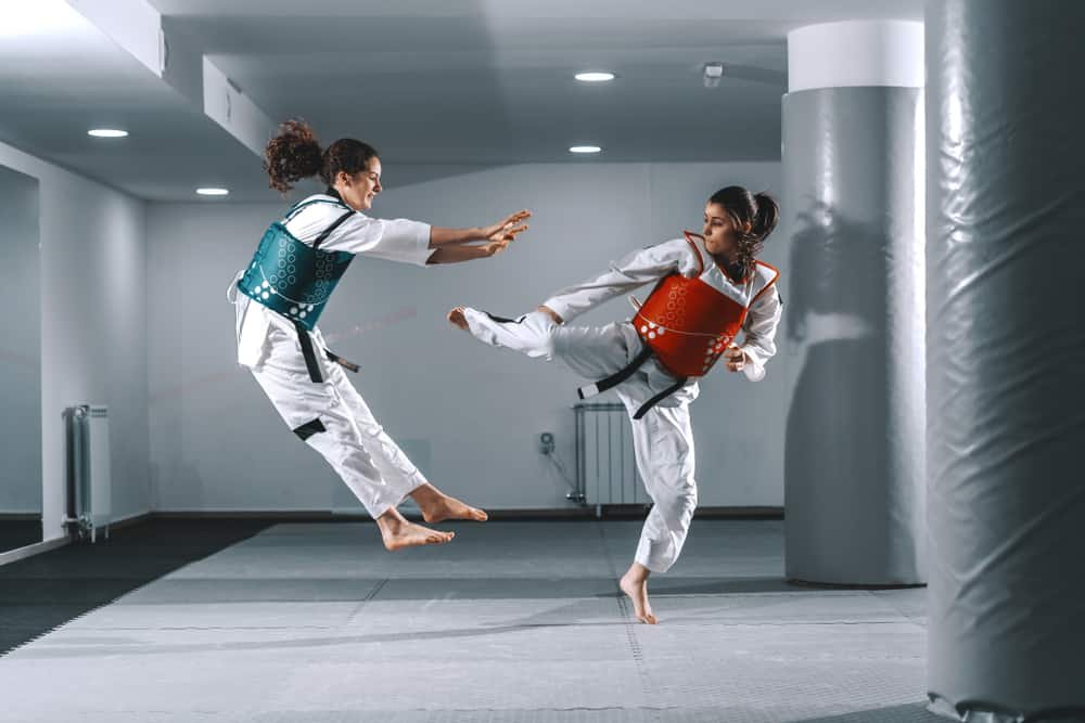 women sparring in taekwondo